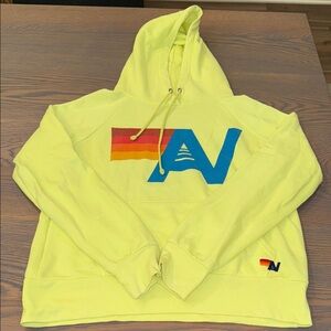 Yellow Hoodie with Colorful Logo